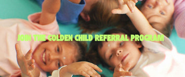 Children lying on a blue surface with text promoting the Golden Child Referral Program.