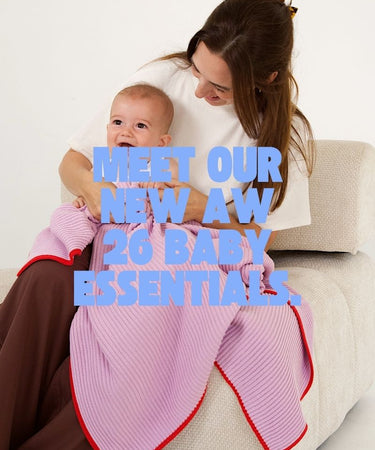 Woman holding a baby with promotional text overlay on a white background
