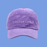 Adjustable panel cap for kids made from soft corduroy, featuring eyelets for ventilation and sun protection.